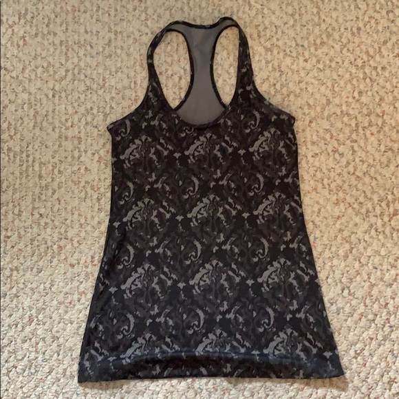 lululemon athletica Tops - Lululemon Racer-back tank top. Size 6